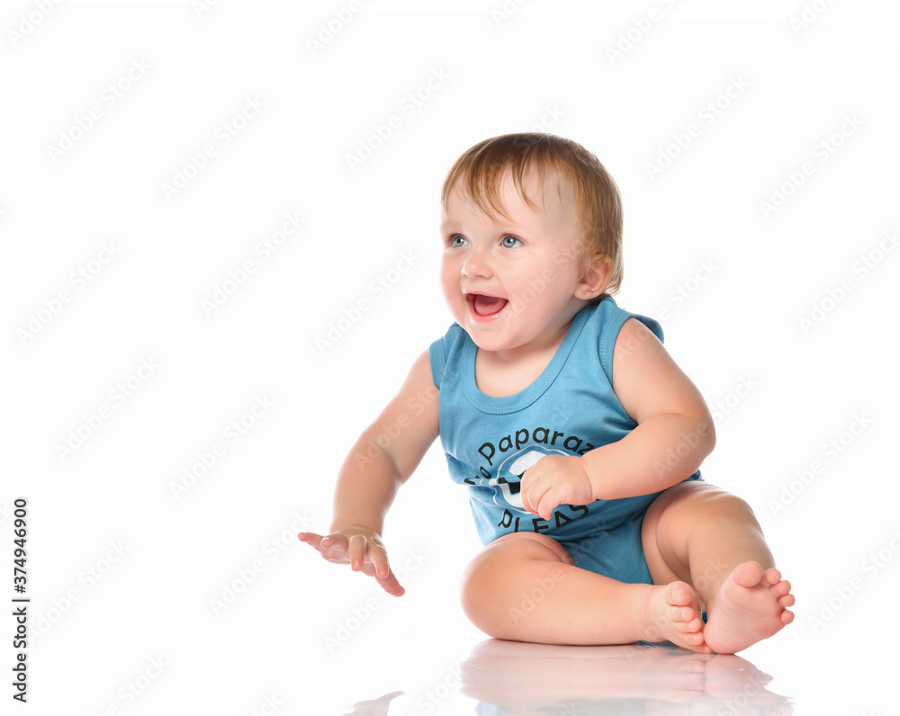 Laughing overjoyed baby in playful mood portrait Laughing overjoyed baby in playful mood portrait