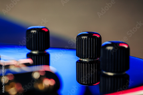 Electric guitar body in the dark close up