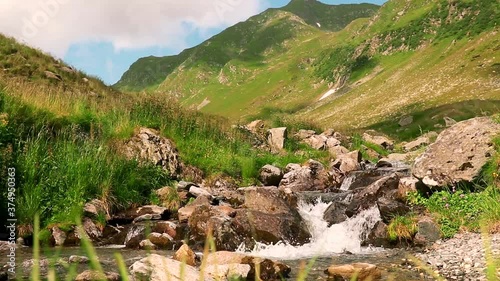 Mountain river in summer time footage 