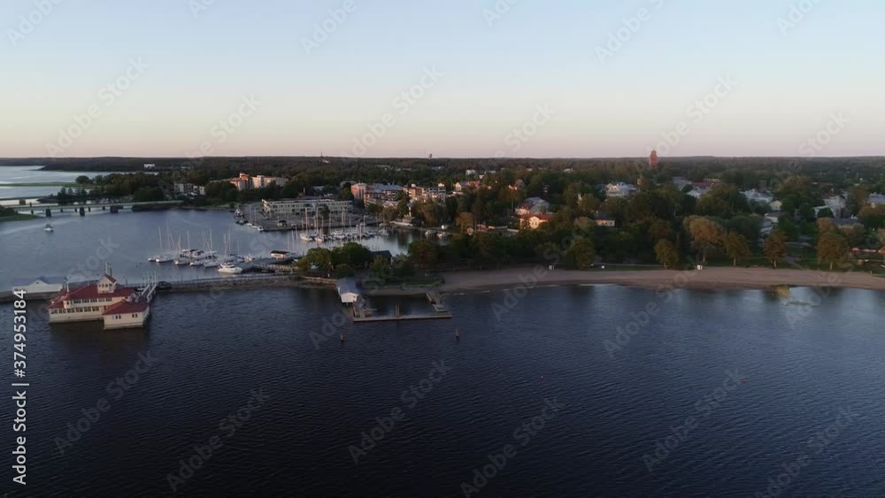 Aerial view of the Tammisaari city harbor, calm, summer evening, in Raasepori, Finland - Tracking, drone shot Aerial view of the Tammisaari city harbor, calm, summer evening, in Raasepori, Finland - Tracking, drone shot