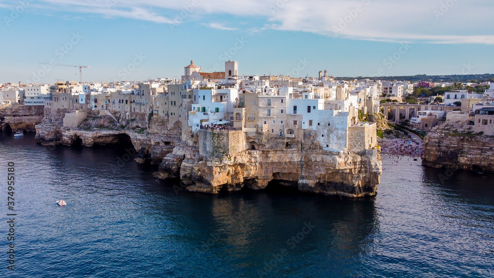 Aerial view of Polignano a Mare, a village built on the edge of the sandstone cliffs above the Adriatic Sea south of Bari in the Apulia region of Italy (southeast)