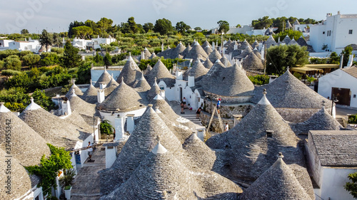 Aerial view of the Trulli of Albarobello in the south of Italy - Traditional Apulian dry stone huts with a conical roof specific to the Itria Valley, in the Murge area of the Italian region of Apulia