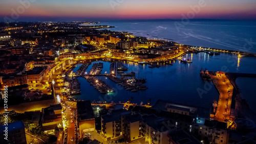 Aerial view of the port of Bisceglie at night - Historic marina in the south of Italy, in the region of Apulia, near the Adriatic Sea