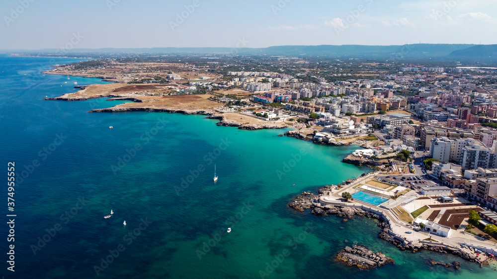Aerial view of Monopoli in Apulia, south of Italy - Irregular coast with sandstone cliffs and blue waters along the Adriatic Sea