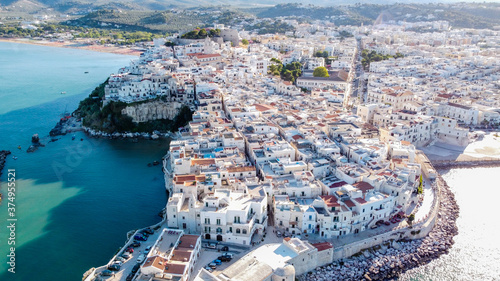 Aerial view of Vieste on the Gargano Peninsula in Italy - White buildings on a hilltop over the Adriatic Sea photo