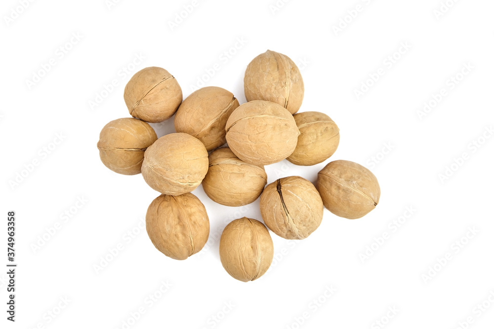 Whole walnuts isolated on white background