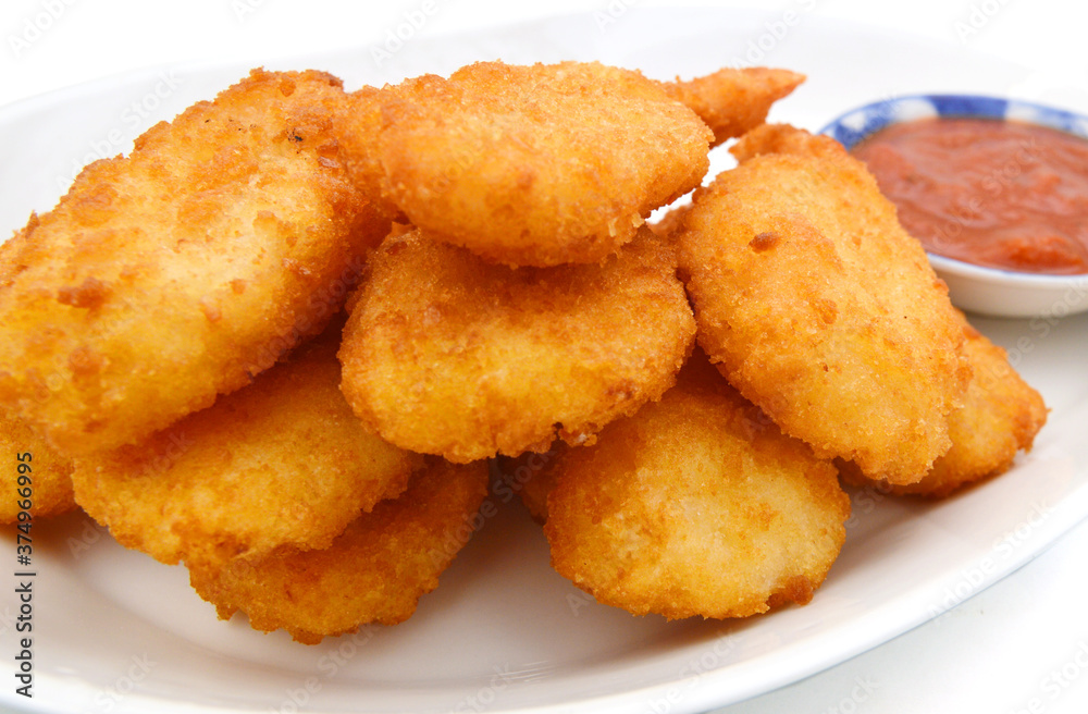 Breaded Butterfly Prawns - Deep fried battered prawns filled with garlic sauce served with chili sauce and lemon wedges. Breaded Butterfly Prawns - Deep fried battered prawns filled with garlic sauce served with chili sauce and lemon wedges.