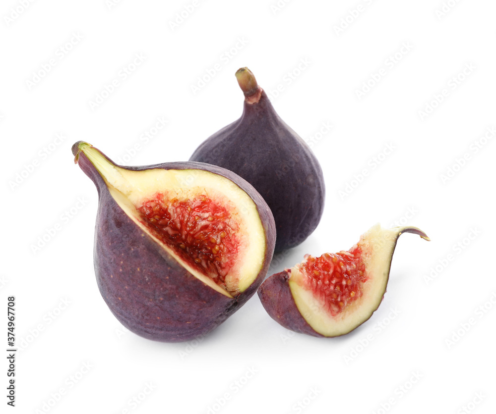 Whole and cut tasty fresh figs isolated on white Whole and cut tasty fresh figs isolated on white