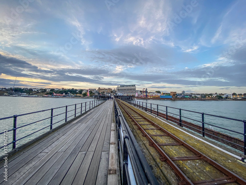 Sea, pier and moody skies Southend on Sea in it's beauty Adventure Island in the dark 
