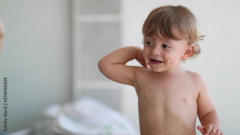 Adorable baby giving high five. Smiling happy toddler child gives high-five Adorable baby giving high five. Smiling happy toddler child gives high-five