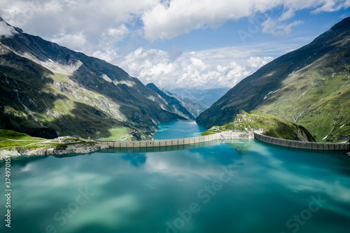 Aerial view of lake Mooserboden and dam wall, Kaprun High Mountain reservoirs, Salzburg, Austria photo