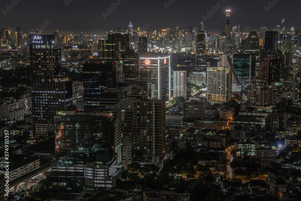 Bangkok, thailand - Aug 28, 2020 : Bangkok downtown cityscape with skyscrapers at night give the city a modern style. Selective focus. Bangkok, thailand - Aug 28, 2020 : Bangkok downtown cityscape with skyscrapers at night give the city a modern style. Selective focus.