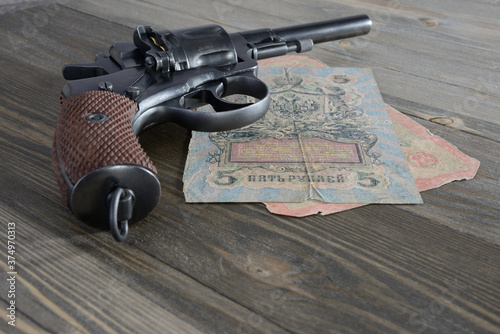 Revolver and money 1909