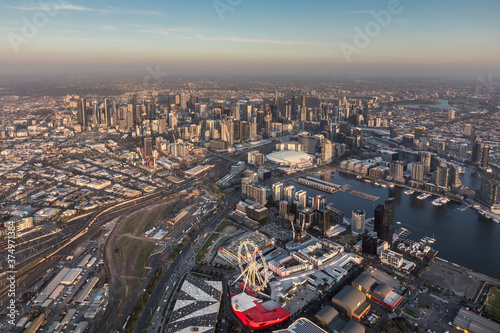 Aerial view of West Melbourne at sunset with the Melbourne CBD and Docklands in view, Austrialia. photo