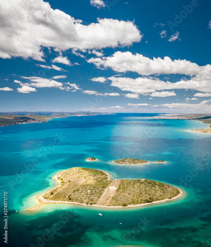 Aerial view of heart shaped Galesnjak Island surrounded by turquoise water in Pasman, Croatia photo