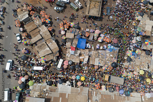 Aerial view of people at a community market in Waterloo, Sierra Leone