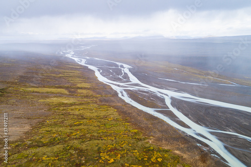 Aerial view of rain shower over Jokulvisl river in Kjolur area in the highlands of Iceland photo