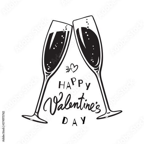 Happy Valentines Day handwritten calligraphic text with two sparkling glasses of champagne