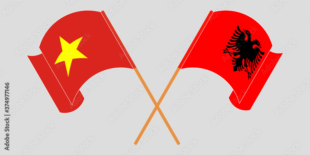Fototapeta premium Crossed and waving flags of Albania and Vietnam