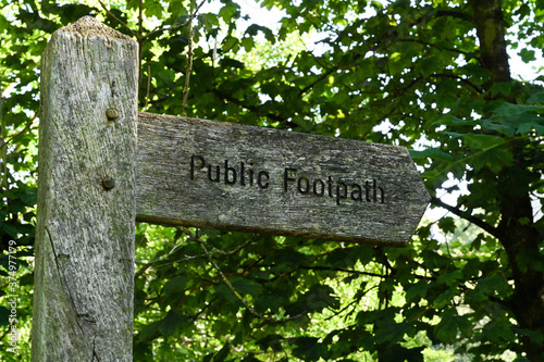 public footpath old wooden signpost photo