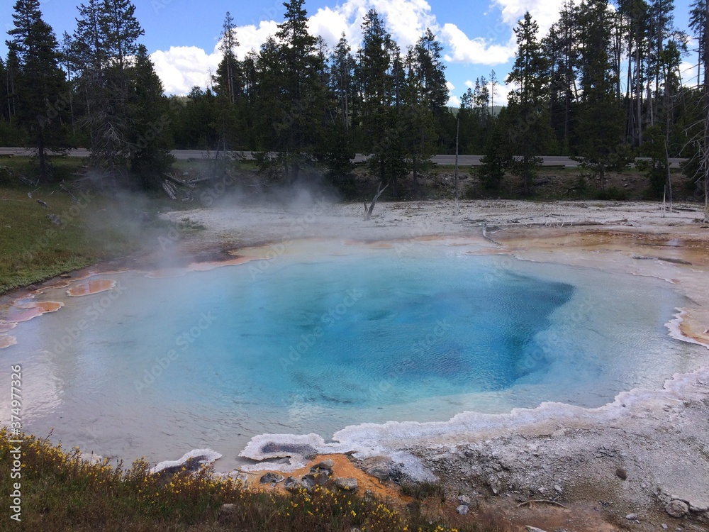 bright blue Yellowstone hot spring bright blue Yellowstone hot spring