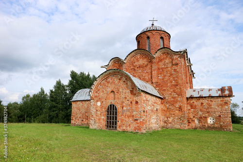 Wallpaper Mural Beautiful medieval church of the Savior on Kovalevo with red walls near Velikiy (Great) Novgorod, Russia Torontodigital.ca