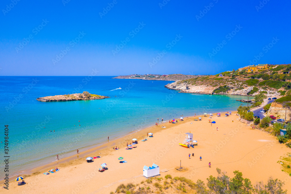 Sandy beach of Kalathas with the picturesque islet in Akrotiri Chania, Crete, Greece.