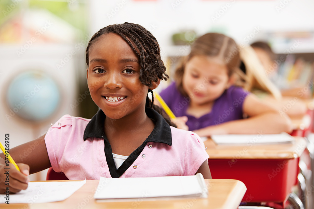 Classroom: Cute Girl Working on Assignment Classroom: Cute Girl Working on Assignment