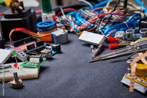 electronic board and tools repairs on black background