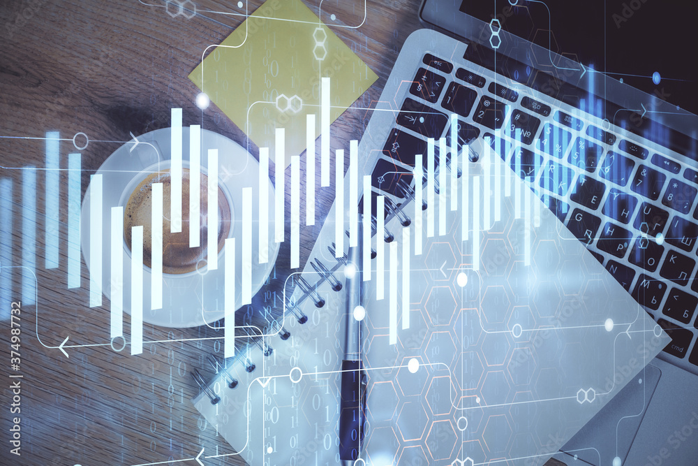 Double exposure of forex chart drawing over table background with computer. Concept of financial research and analysis. Top view. Double exposure of forex chart drawing over table background with computer. Concept of financial research and analysis. Top view.