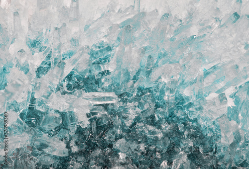 Bild auf Leinwand light and dark cyan small crystals background