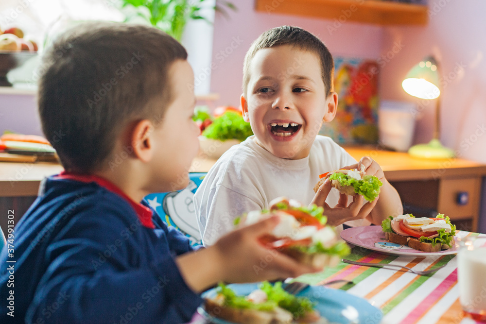 Boys Having Breakfast