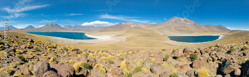 South America, Chile, Norte Grande, Antofagasta Region, Atacama desert, Los Flamencos National Reserve, Panoramic view of Laguna Miscanti and Laguna Miniques at an altitude of 4300m and the peaks of Cerro Miscanti and Cerro Miniques reaching altitudes of photo