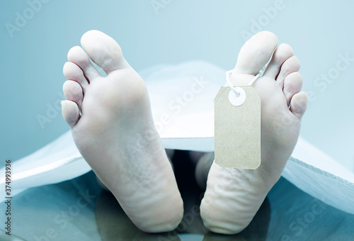 Feet of a dead person.