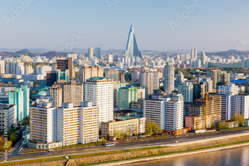 Democratic Peoples's Republic of Korea (DPRK), North Korea, Pyongyang, elevated city skyline including the Ryugyong hotel and Taedong river photo