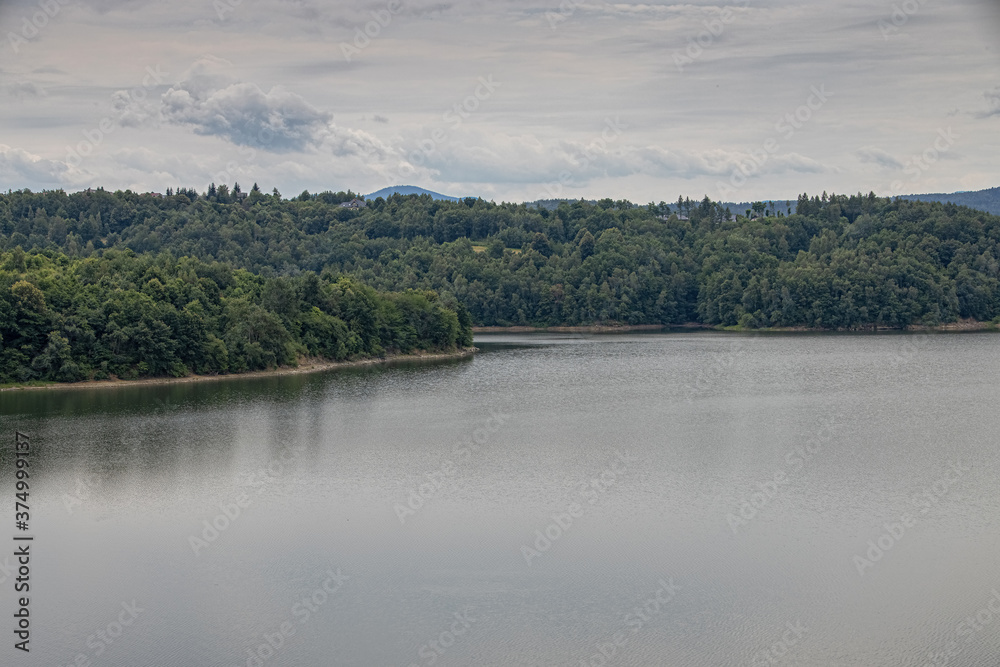  landscape of the lagoon at the dam in Dobczyce in Poland on a warm summer cloudy day