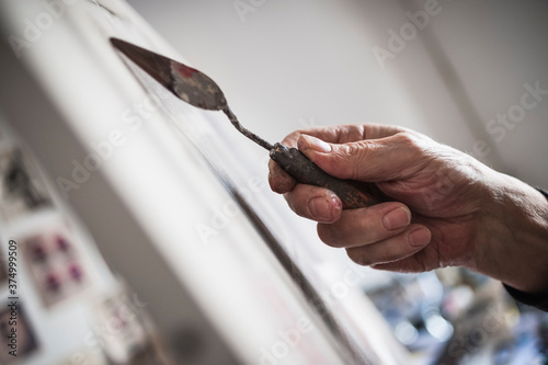 Hand drawing with a trowel photo