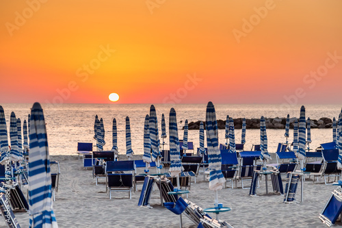 sunset on sea resort in Italy photo