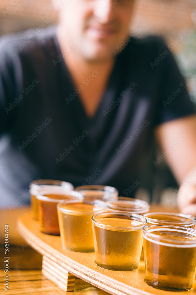 a man enjoying beer tasting a man enjoying beer tasting