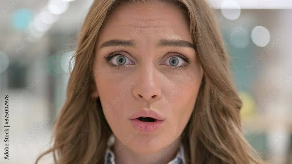 Close up of Face of Woman feeling Shocked Close up of Face of Woman feeling Shocked