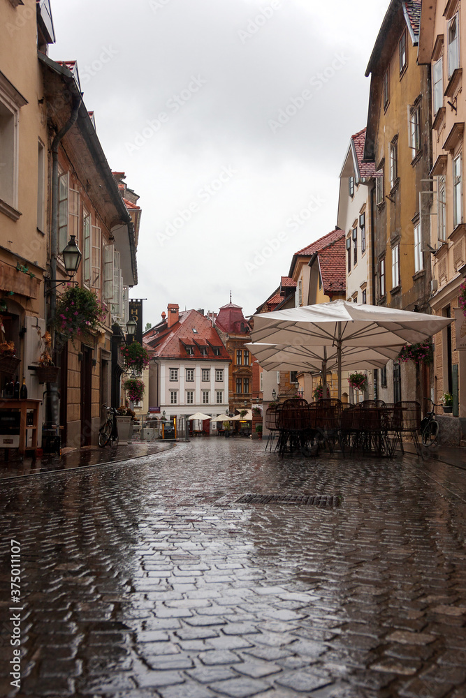 The old narrow street on a rainy day