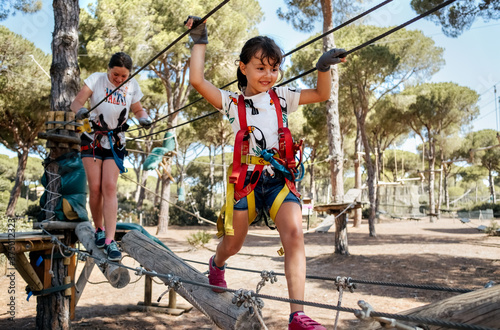 Little girls in an adventure park