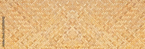 Obraz  z motywem Traditional handcraft woven bamboo texture for banner, weave wood pattern background.