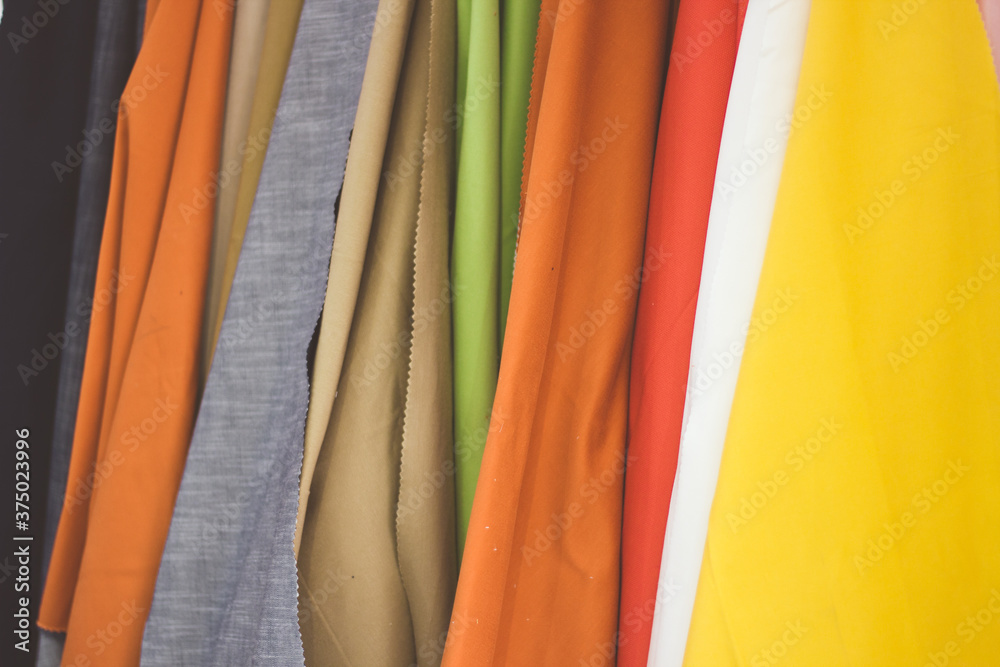 colorful t shirts on hangers