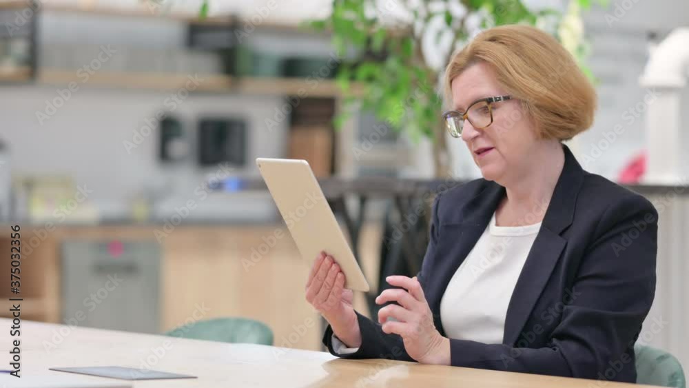 Businesswoman doing Video Call on Tablet Businesswoman doing Video Call on Tablet