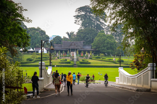 bogor / Indonesia - August 9, 2020. Morning atmosphere in Bogor Botanical Garden which is visited by visitors who are on vacation. photo