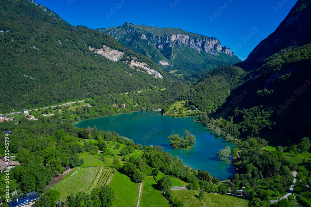 Aerial view of Lake Tenno in autumn, Trento, Italy, Europa. Mountain lake in the alps of Italy. Turquoise lake in the mountains.