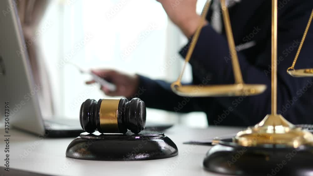 Male lawyer or judge consult having team meeting with client, Law and Legal services concept Male lawyer or judge consult having team meeting with client, Law and Legal services concept