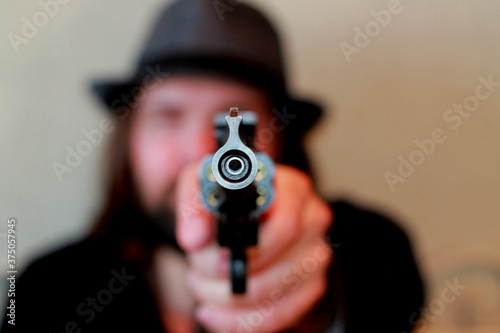 Wallpaper Mural young man with gun Torontodigital.ca