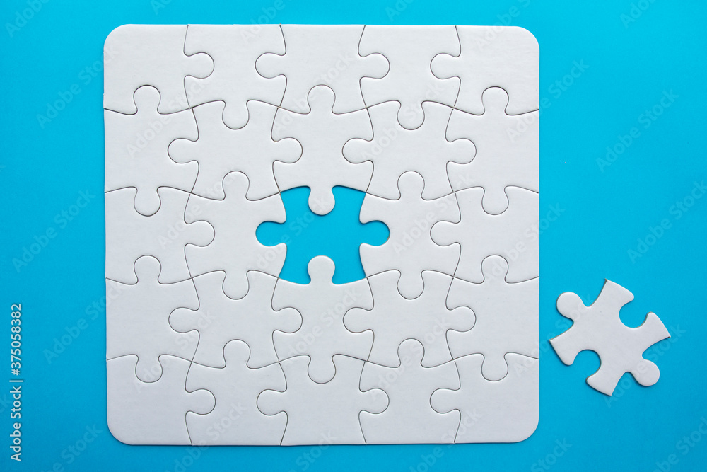 The last missing jigsaw puzzle piece. Business success concept. The last missing jigsaw puzzle piece. Business success concept.